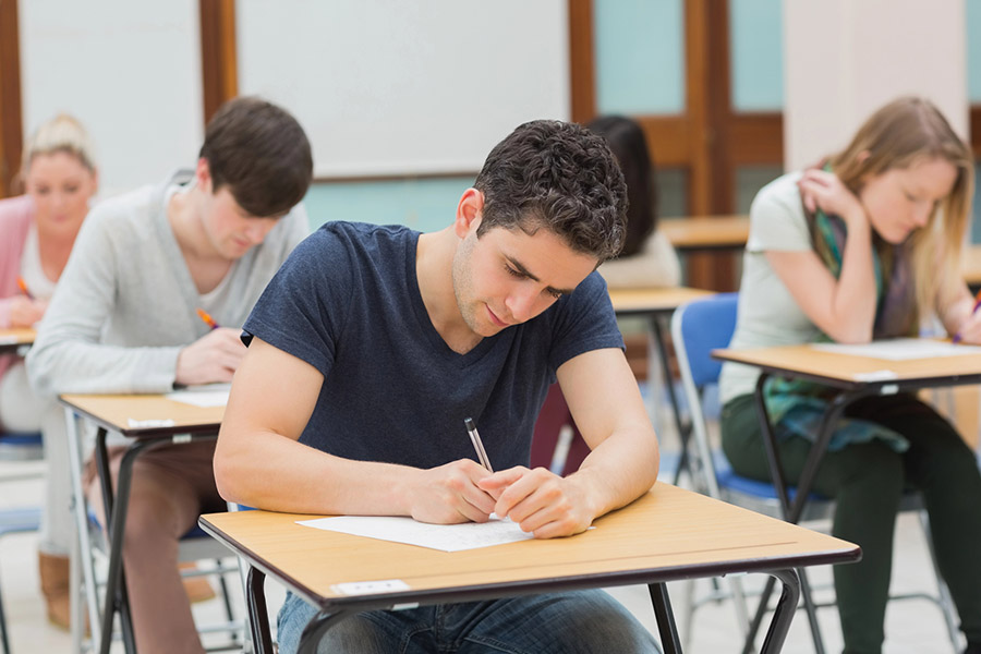 Students taking a test in a classroom in Denver